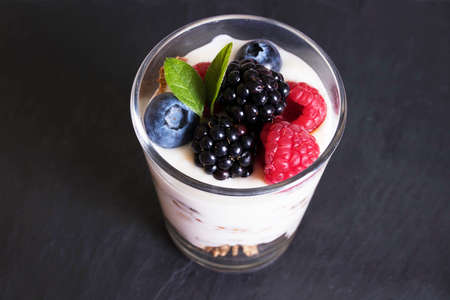 yogurt with berries, breakfasts and creative dessertsの写真素材