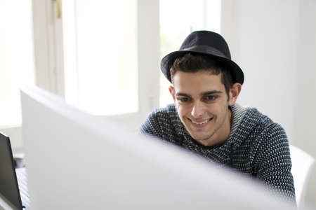 young working with your computer at home or in the office manの写真素材