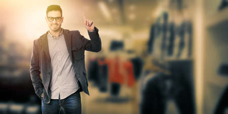 businessman on background pointingの写真素材