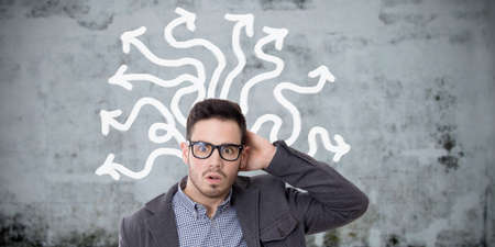 expression of young surprised with the arrows of different addressesの写真素材