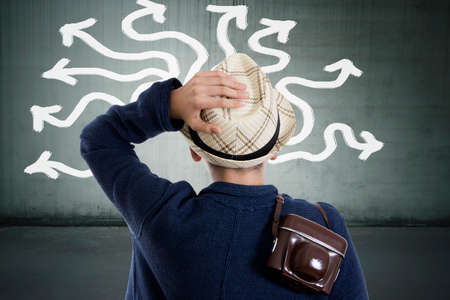 child with the camera and hat, for travel and adventureの写真素材