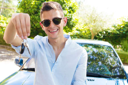 young in the car with the keys, buy car