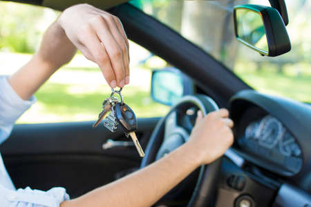 hands of the driver with the car keys