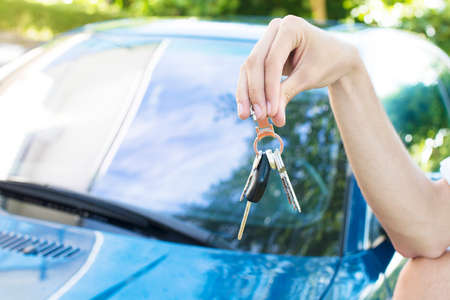 hands with car keys, concept to buy car