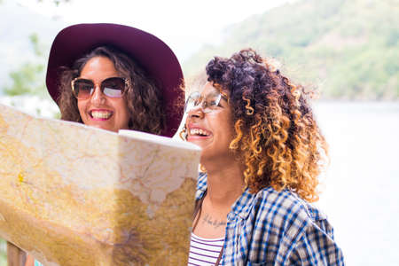 young friends of tour and travel with holiday mapの写真素材