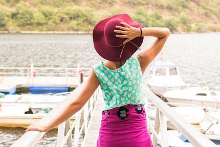 portrait of young girl at the Jetty on summer vacationの写真素材