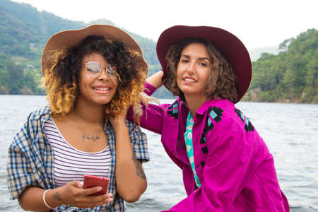 friends with the mobile outdoorの写真素材