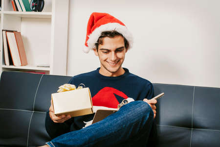 young at home with the gift writing the letterの写真素材