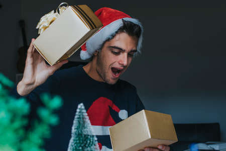 young at the office or studying with the christmas gift