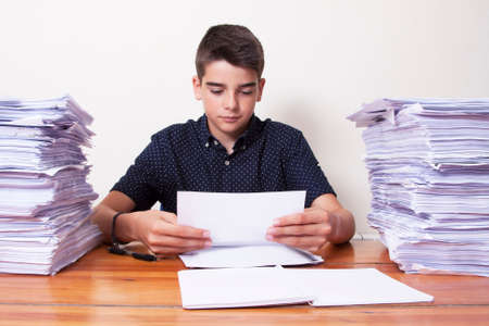 child on the school desk studying