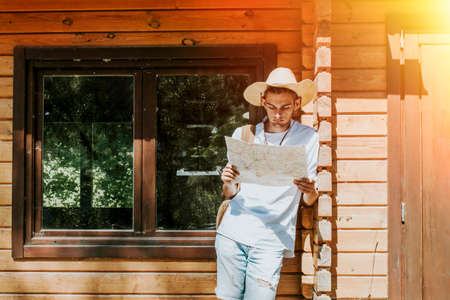 young man with adventure clothing, travel and explorationの写真素材