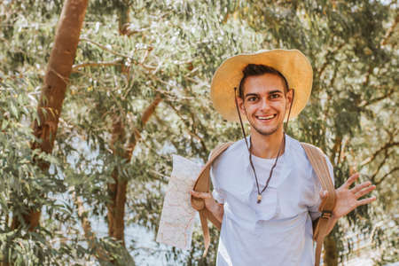 young man with adventure clothing, travel and exploration