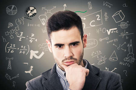 business man portrait with formulas and charts