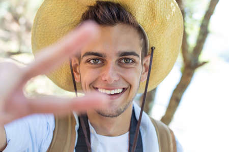 portrait of young adventurer travellingの写真素材