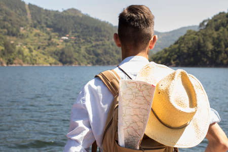 traveler with backpack and mapの写真素材