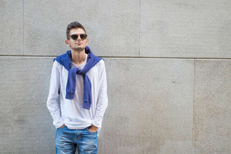 Portrait young man teenager on the street