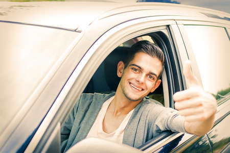 young man in the car