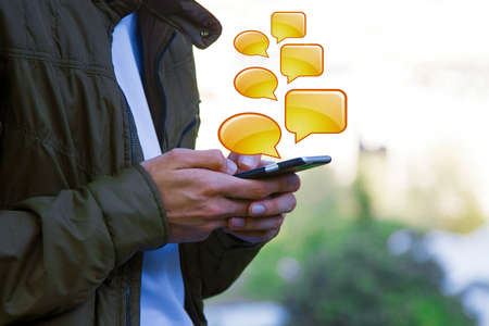 hands with mobile phone chatting and chatting with messages