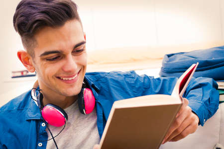 young college teenager studying at home