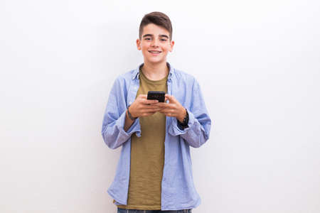 young preteen with mobile phone