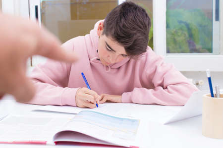child student write on the home or school deskの写真素材