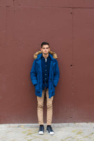 young fashioned on the wall of the city streetの写真素材