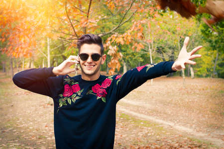young fashioned mobile phone in autumn