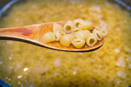 macaroni in the pot cookingの写真素材