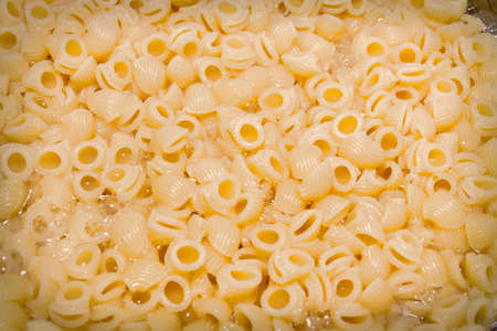 macaroni in the pot cookingの写真素材
