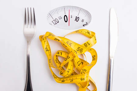 scale with tape measure, concept of diet and healthy life