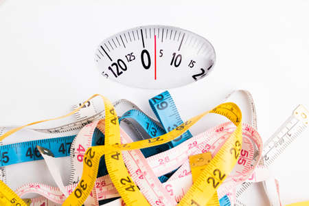 scale with tape measure, concept of diet and healthy life