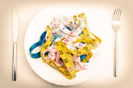 plate with tape measure, diet conceptの写真素材