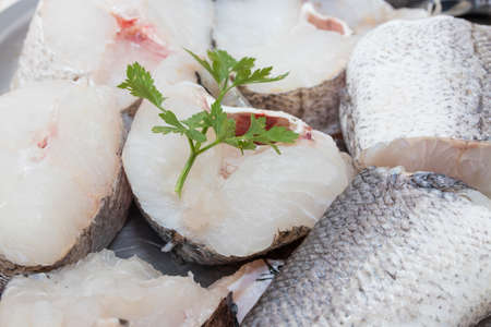 raw sliced hake fishの写真素材