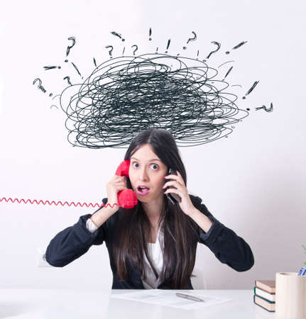 woman in the office with problems and stress on the phone