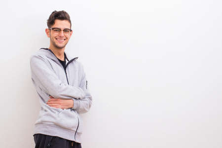 young casual style on the white wallの写真素材