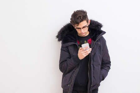 young with mobile phoneの写真素材