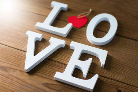 love in letters on a wooden backgroundの写真素材