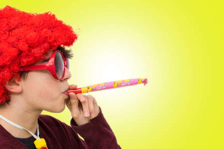 teenager or preteen disguised as a carnival or birthdayの写真素材