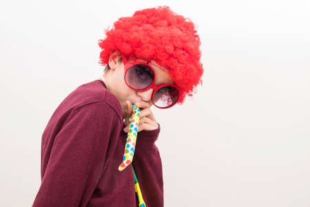 child disguised as carnival isolated in whiteの写真素材