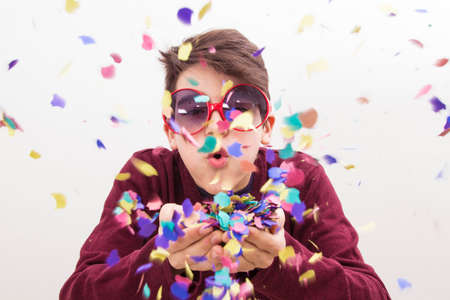 child disguised as carnival isolated in whiteの写真素材