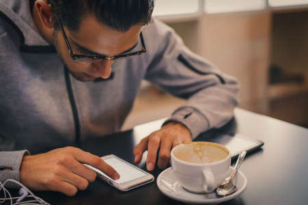 modern young fashion with mobile phoneの写真素材