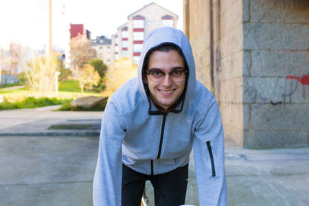 young athlete riding a bike in the city