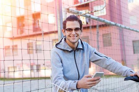 young bike with outdoor mobile phoneの写真素材