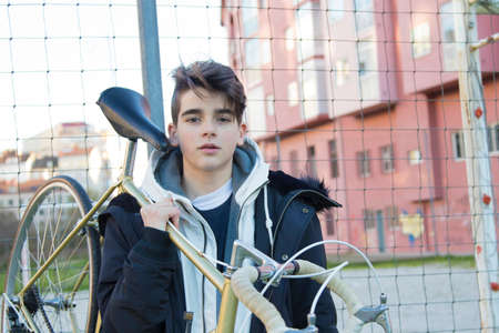 young to the fashion with the outdoor bicycleの写真素材