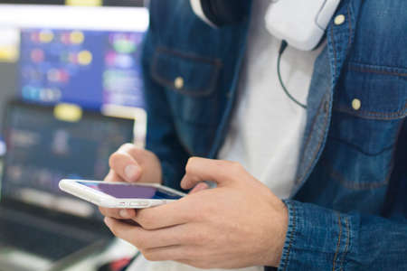 closeup of hands with mobile phoneの写真素材