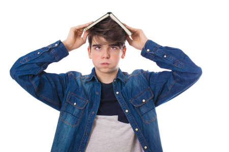 stressful student with books isolated in white backgroundの写真素材