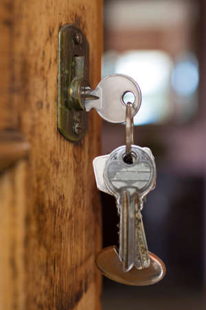 vintage door with keys in the lockの写真素材