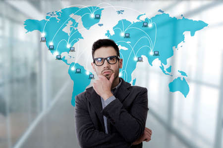 thoughtful businessman with computer networks