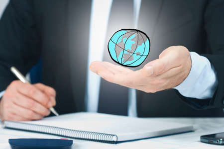 Hand business man with balloon globe, globalizationの写真素材