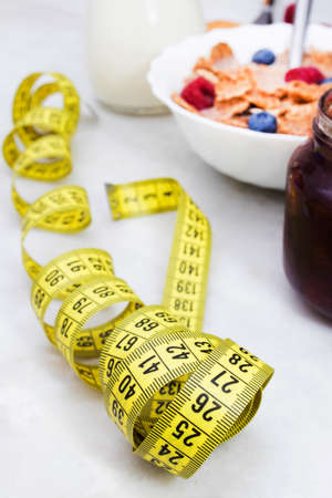 tape measure with healthy breakfast, diet concept